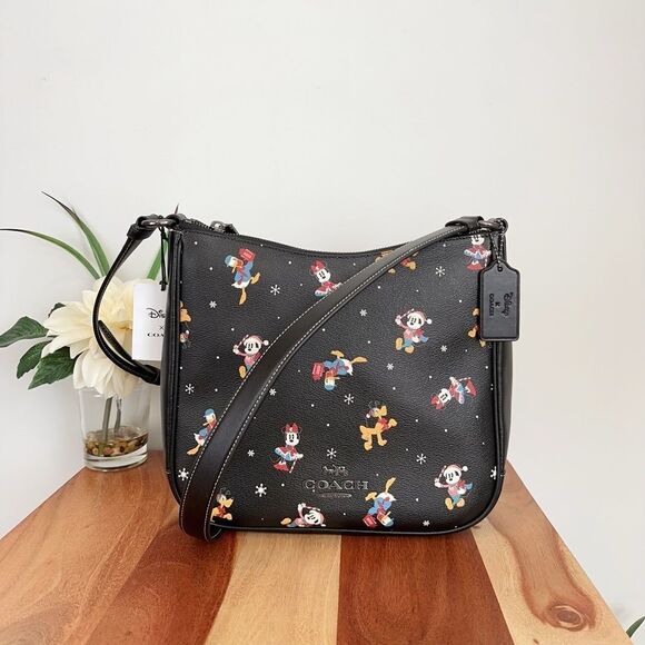 Coach Handbags - NWT Disney X Coach Ellie File Bag With‎ Holiday Print